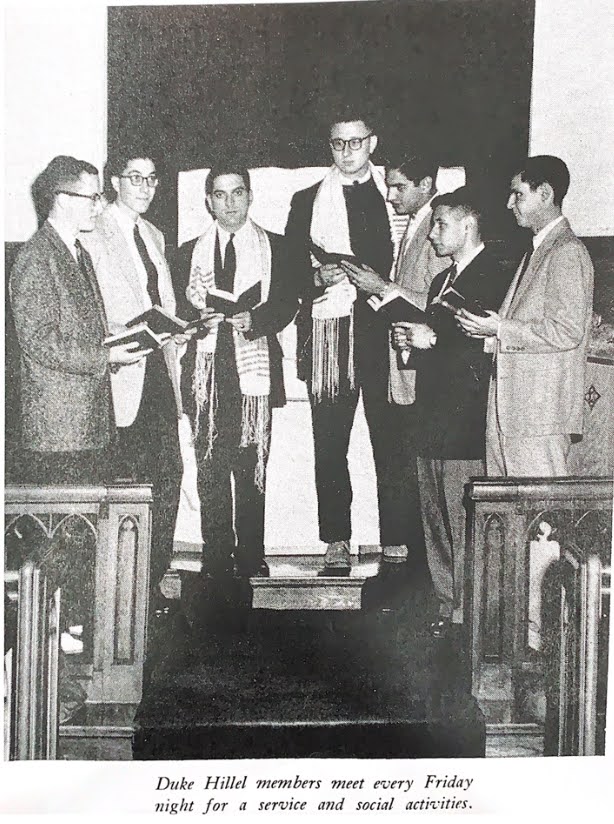 black & white photo of Duke Jewish Students in the 50s at Hillel Shabbat meeting at Duke's Divinity School