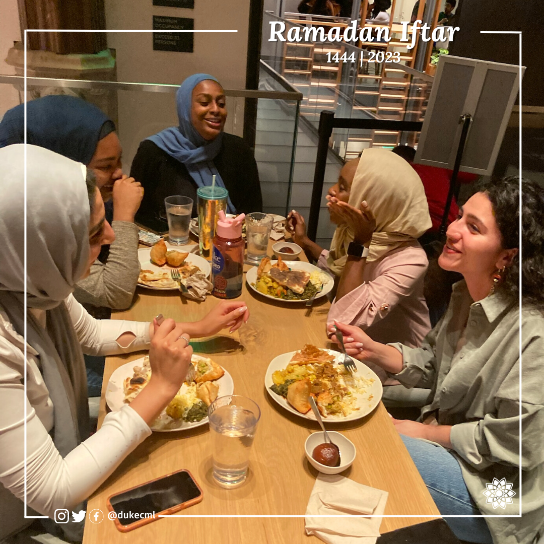 muslim students sit around a table for a Ramadan Iftar