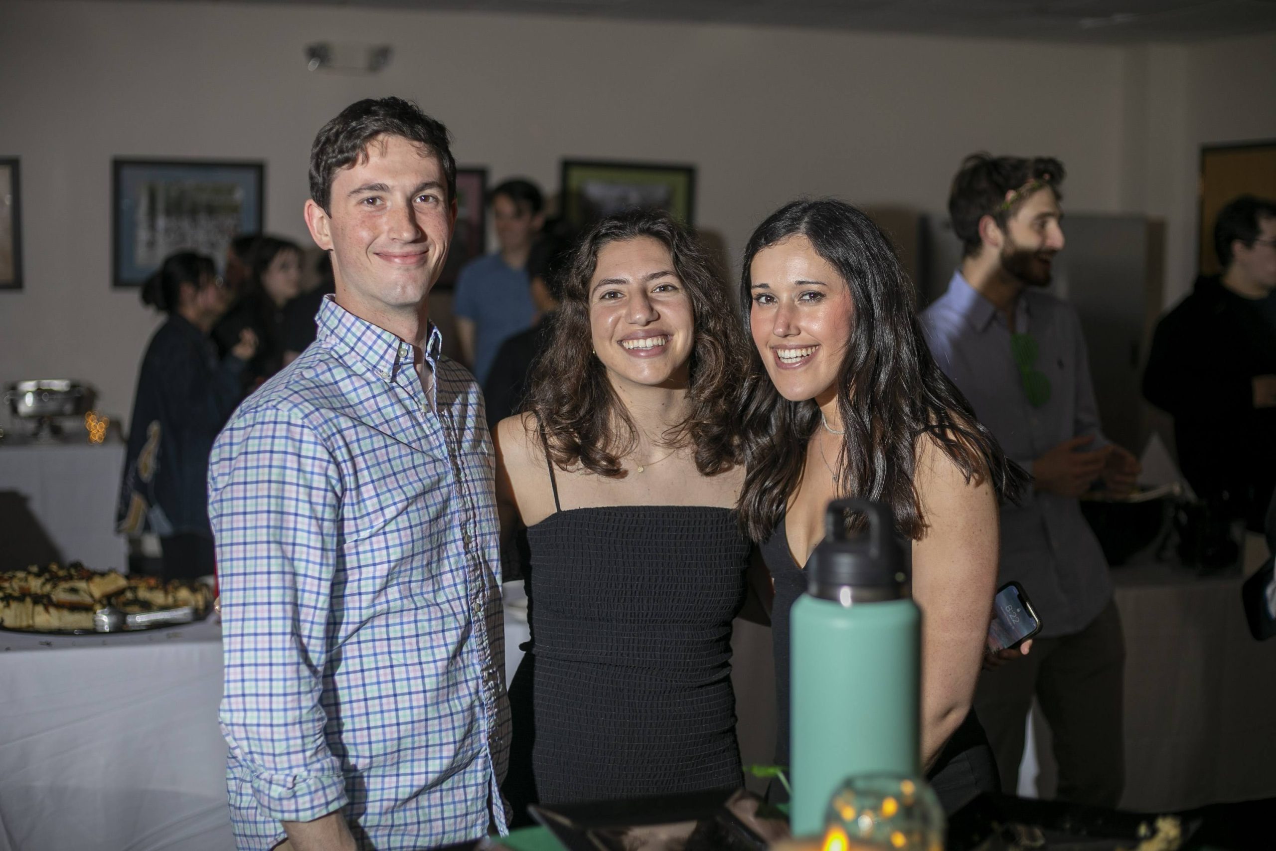 Jewish students smile at an event