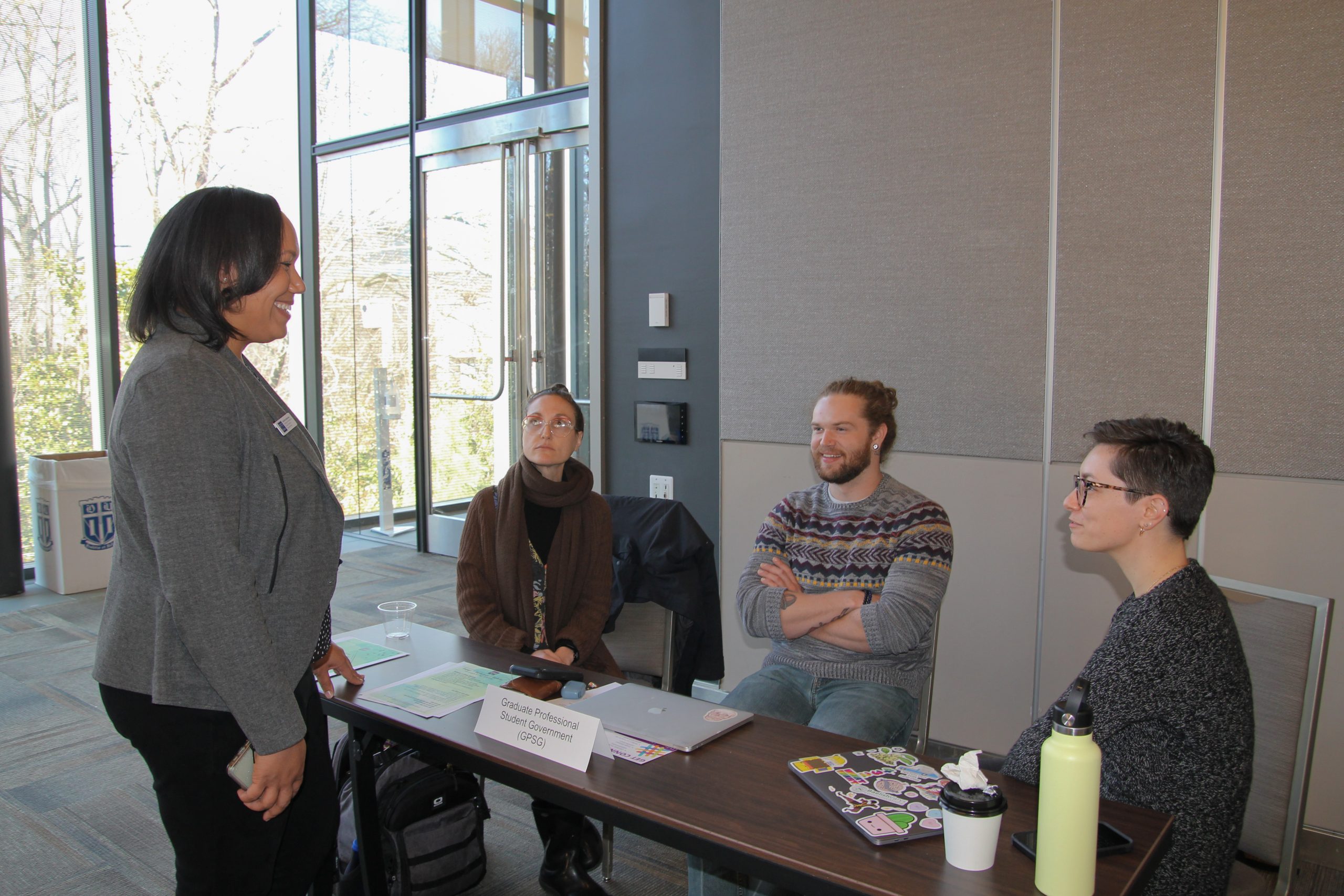 Genille Anderson meets with graduate and professional students for the pilot faculty lunch program