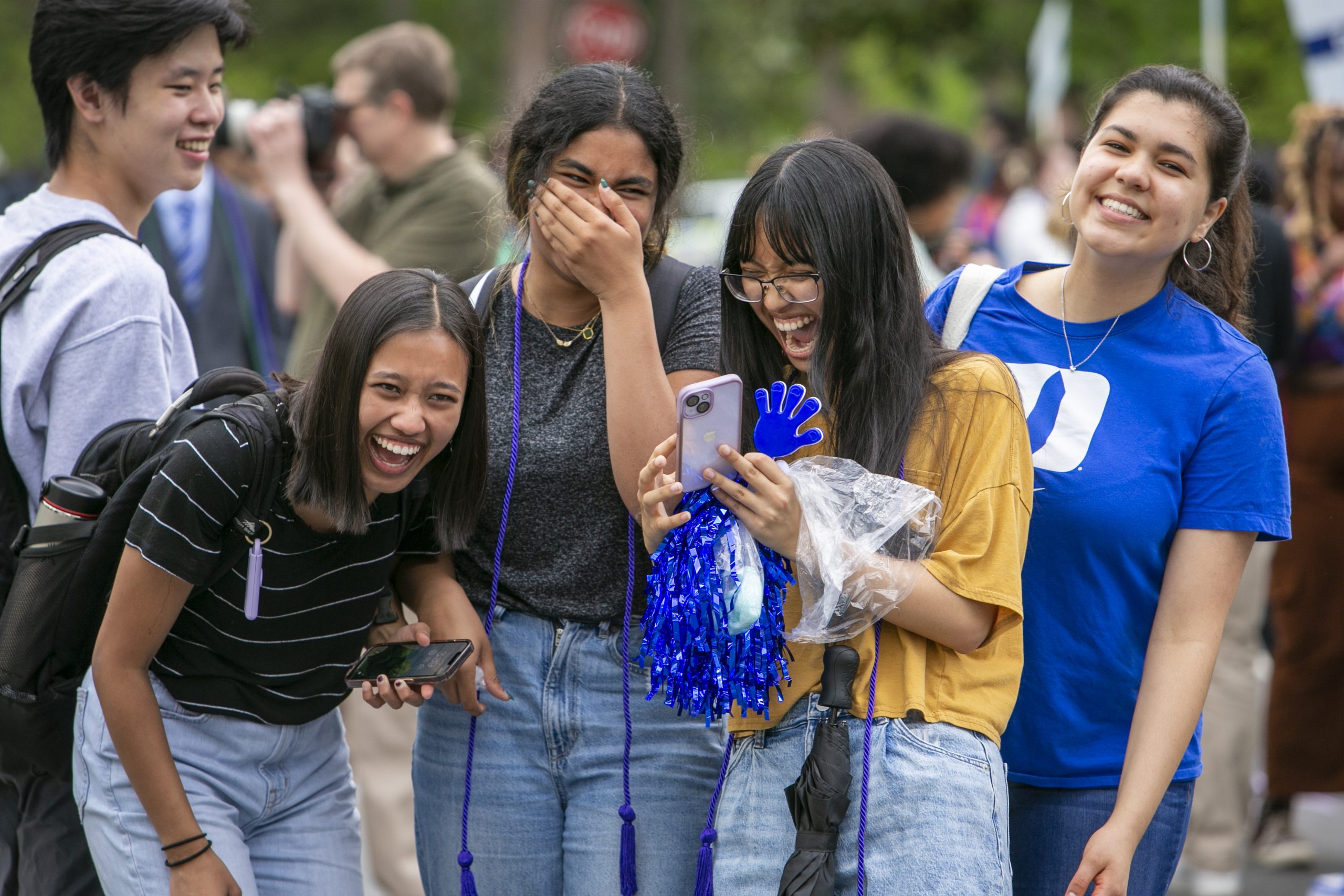 First-year students share a laugh before the Bricks to Stone parade