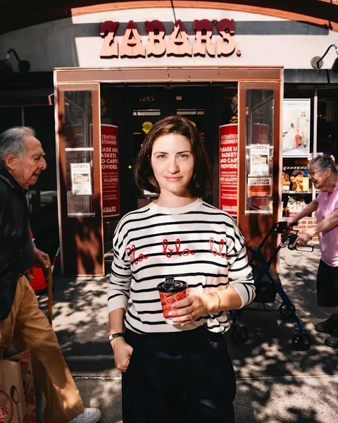 Stephanie Butnick posing in front of Zabar's